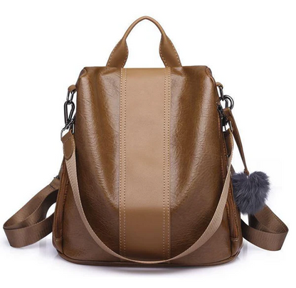 Kvinders tyverisikret læderrygsæk